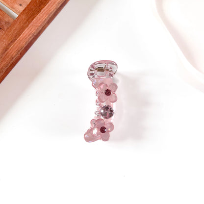 Flower charm mini banana clip in pink
