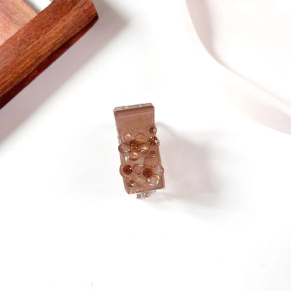 Brown flower crystal catch clip frosted translucent body