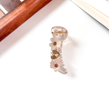 Blush pink mini banana clip with delicate flowers and faceted rhinestones, 6cm