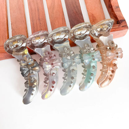All 5 glimmer bow clips: sage, white, peach, mauve, smoky, beige with rhinestone details