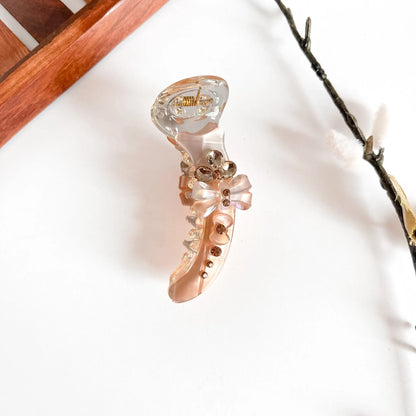 Peach glimmer bow banana clip with polished crystalline barrel, 8cm medium hair clip