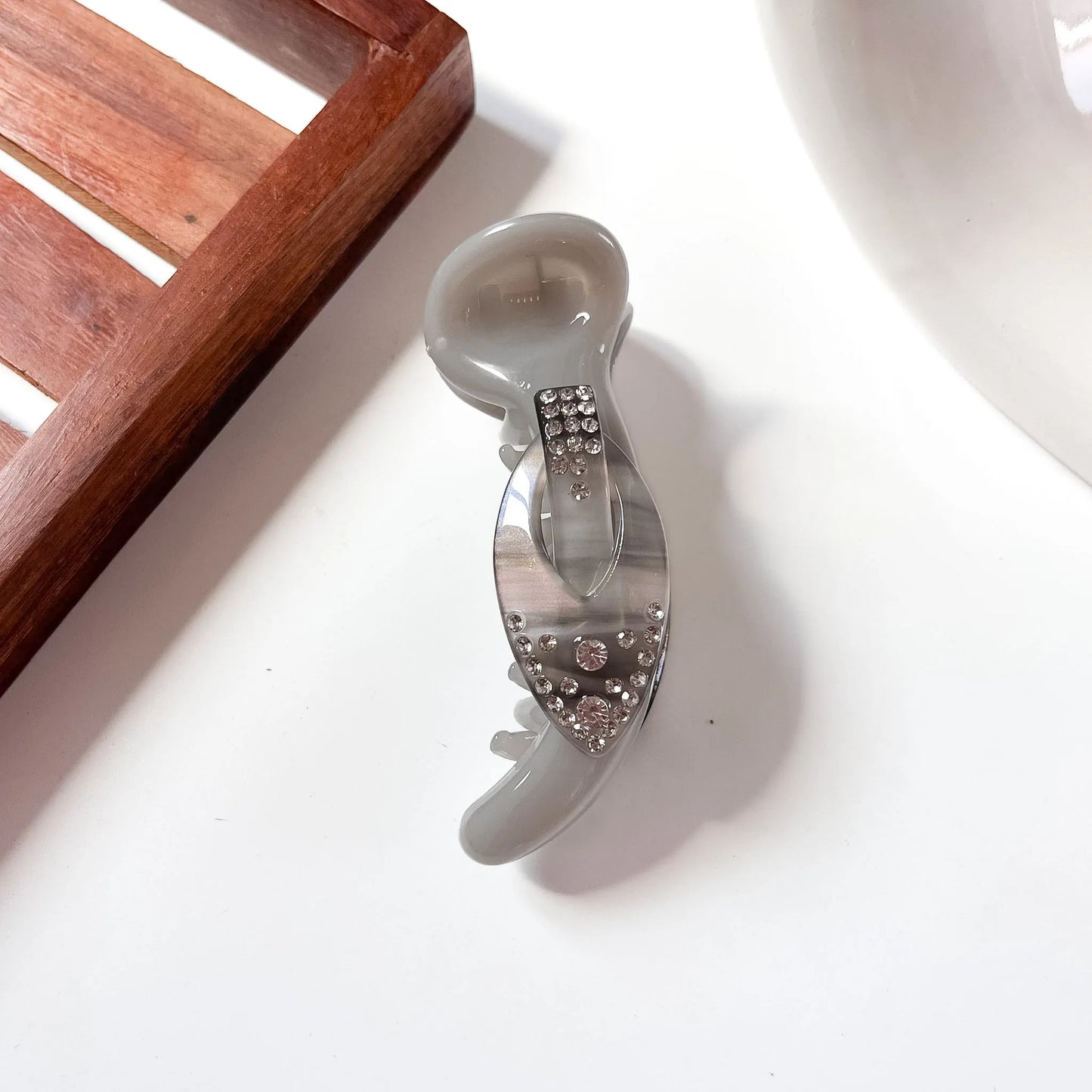 Grey gloss gem banana clip with scattered rhinestone panel for thick hair