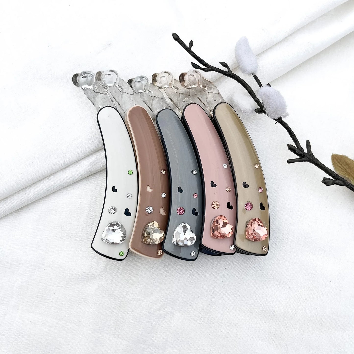 Color swatch: all 5 heart gem lock banana clip shades displayed in a row