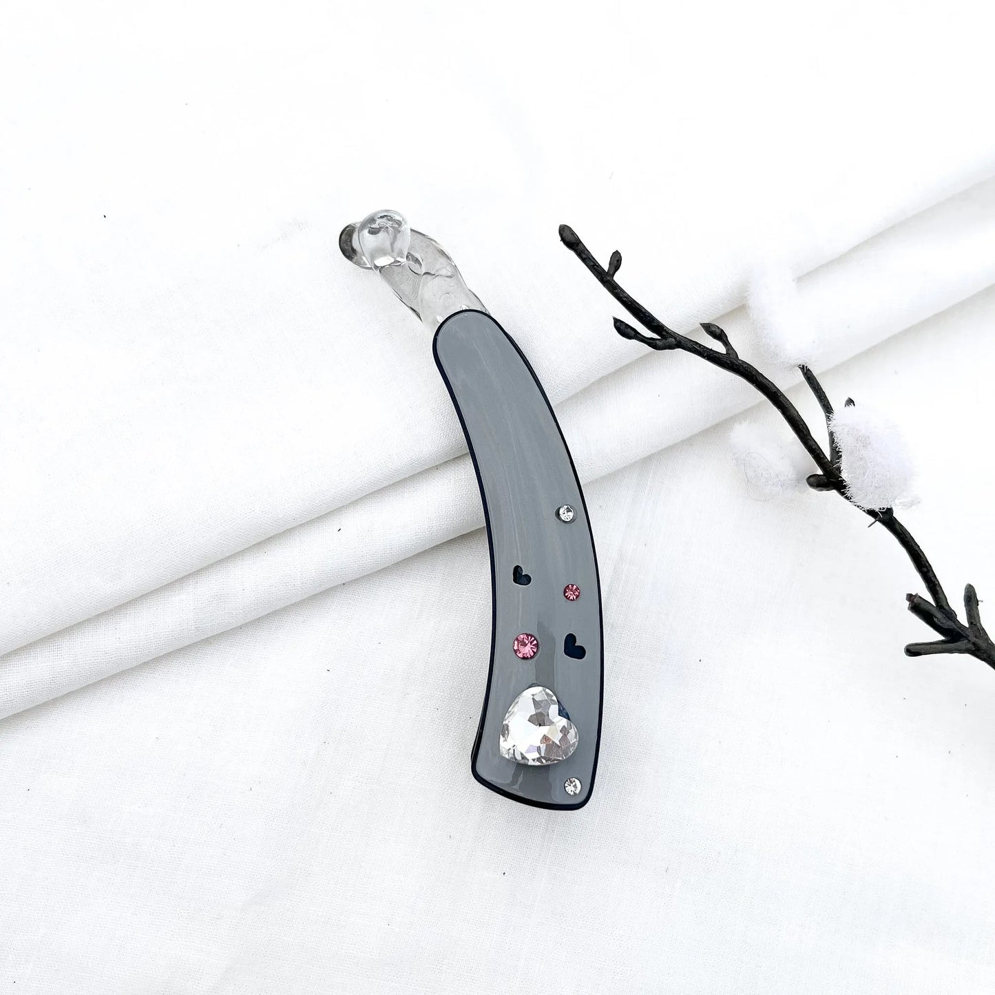 Grey/slate lock banana clip with faceted heart gem and scattered rhinestone hearts, 8cm