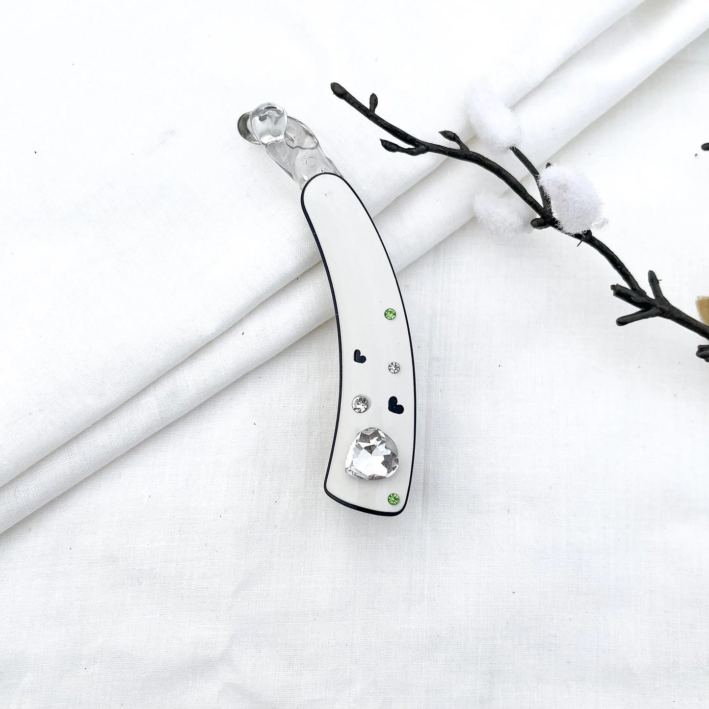 White acrylic lock banana clip with faceted heart gem and rhinestone heart details, 8cm