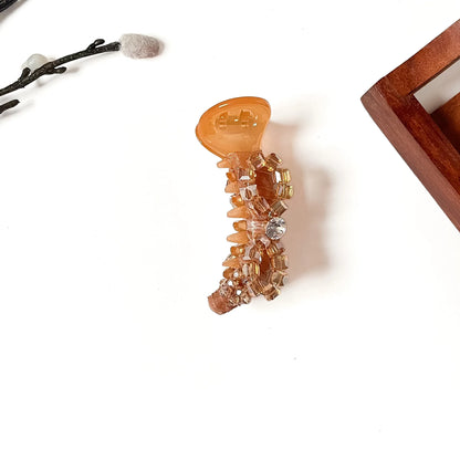 Amber champagne brown stylish banana clutcher with crystal bow, 8cm