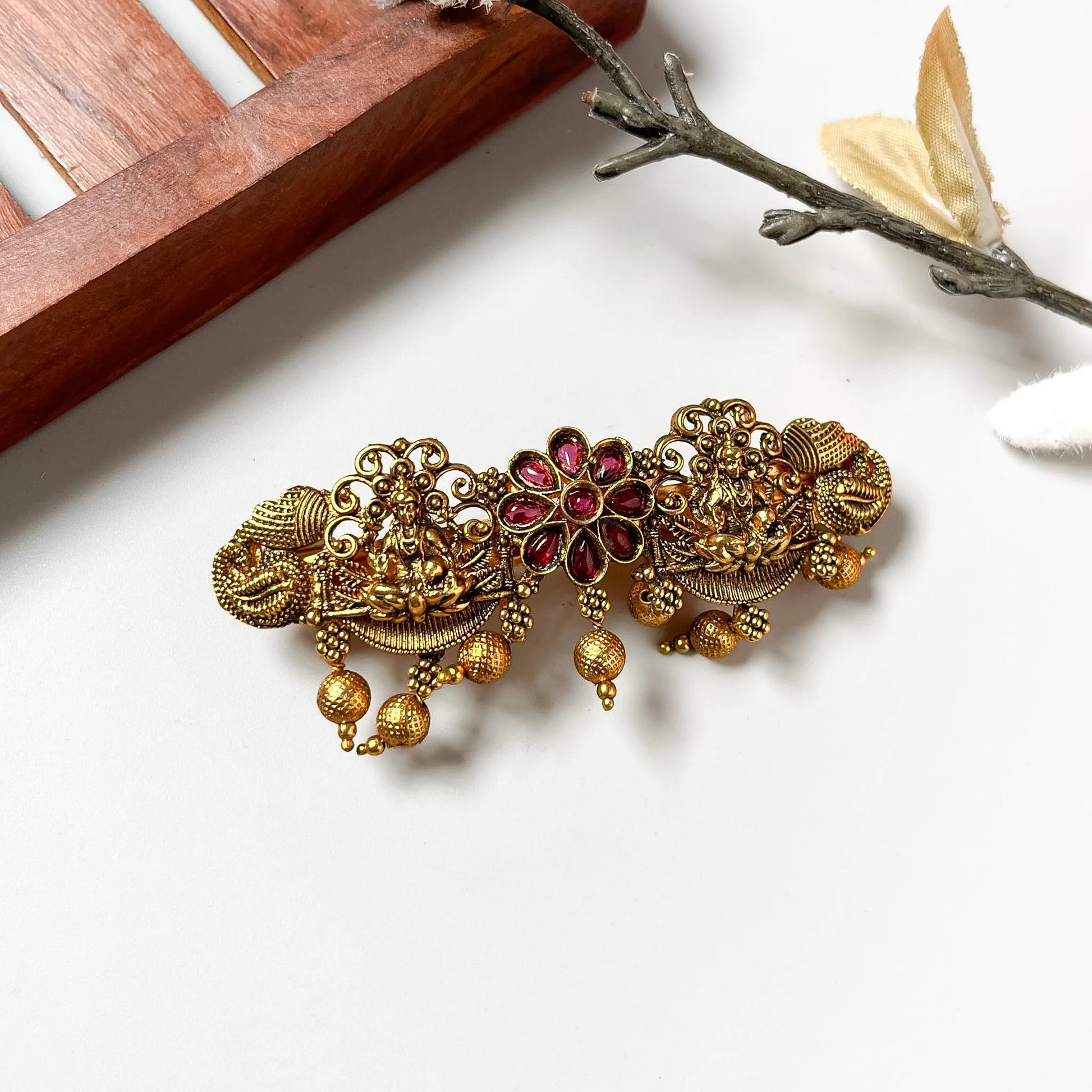 Vintage Lakshmi barrette with ruby red flower motif, elaborate brass filigree, 6cm traditional clip
