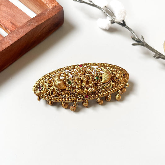 Antique gold Lakshmi centre clip with red and green kemp stones and ghungroo drops
