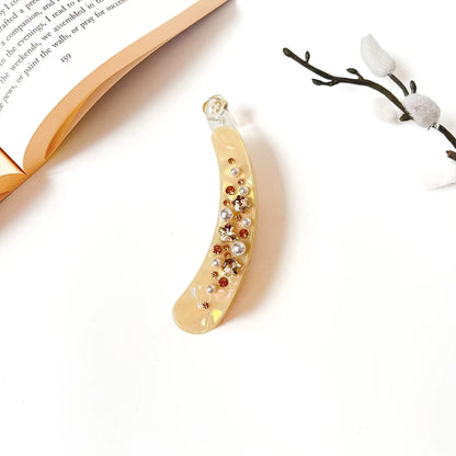 Light honey pearl banana hair clips with rhinestone detail, fancy decorative design