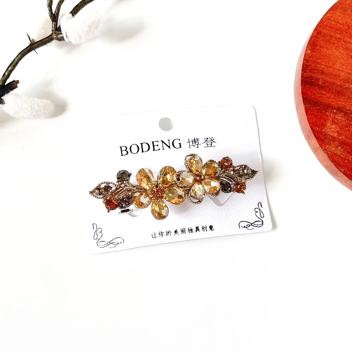 Champagne gold crystal flower hair barrette with filigree leaves, a fancy floral hair clip with stones