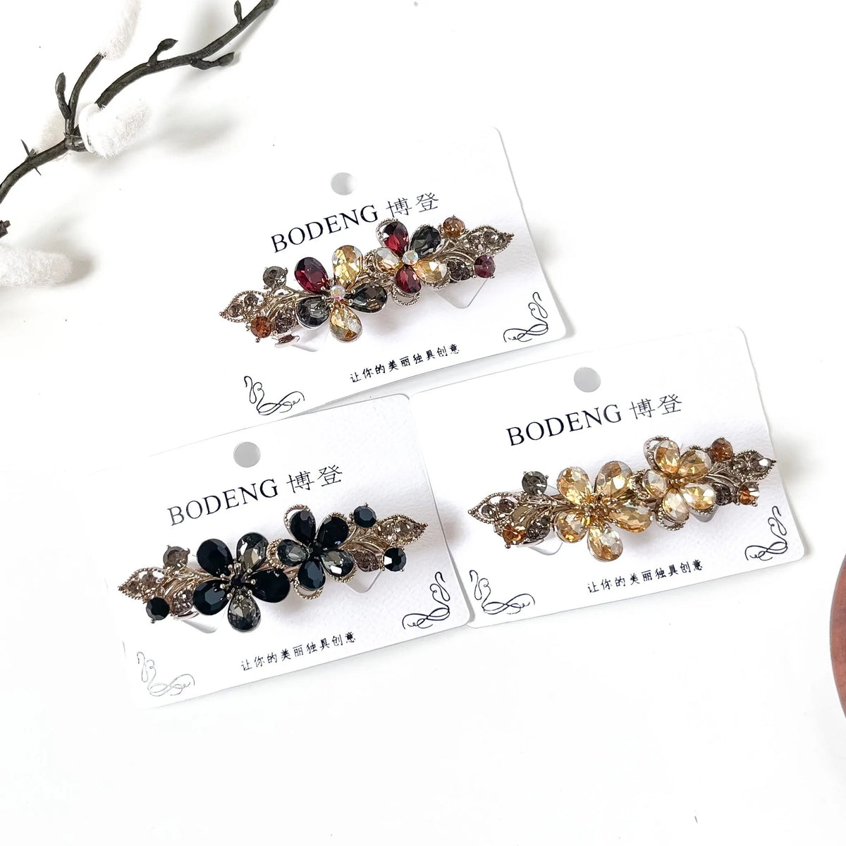 Malli crystal flower barrettes in champagne gold, noir black and harvest multicolour