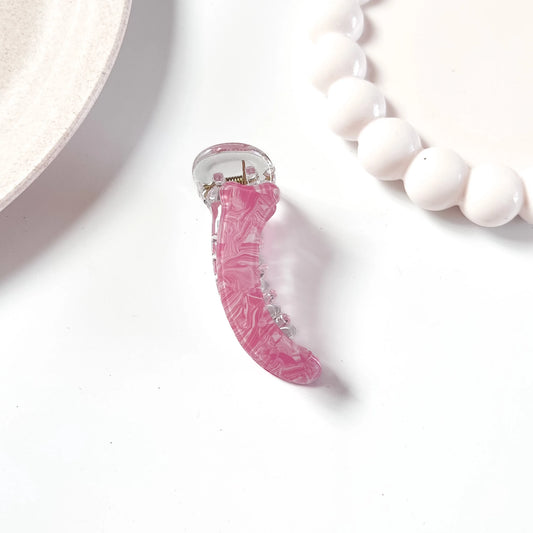 Pink marble acetate banana clip with clear acrylic teeth