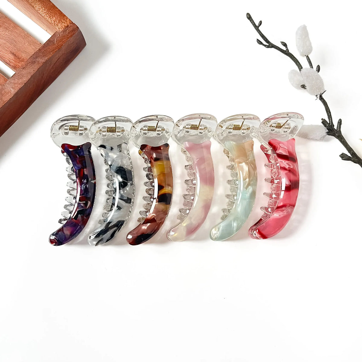 Marble Muse 8 cm marble banana clips in plum purple, ink black white, tortoise brown, rosé pink, seafoam mint green and cherry red