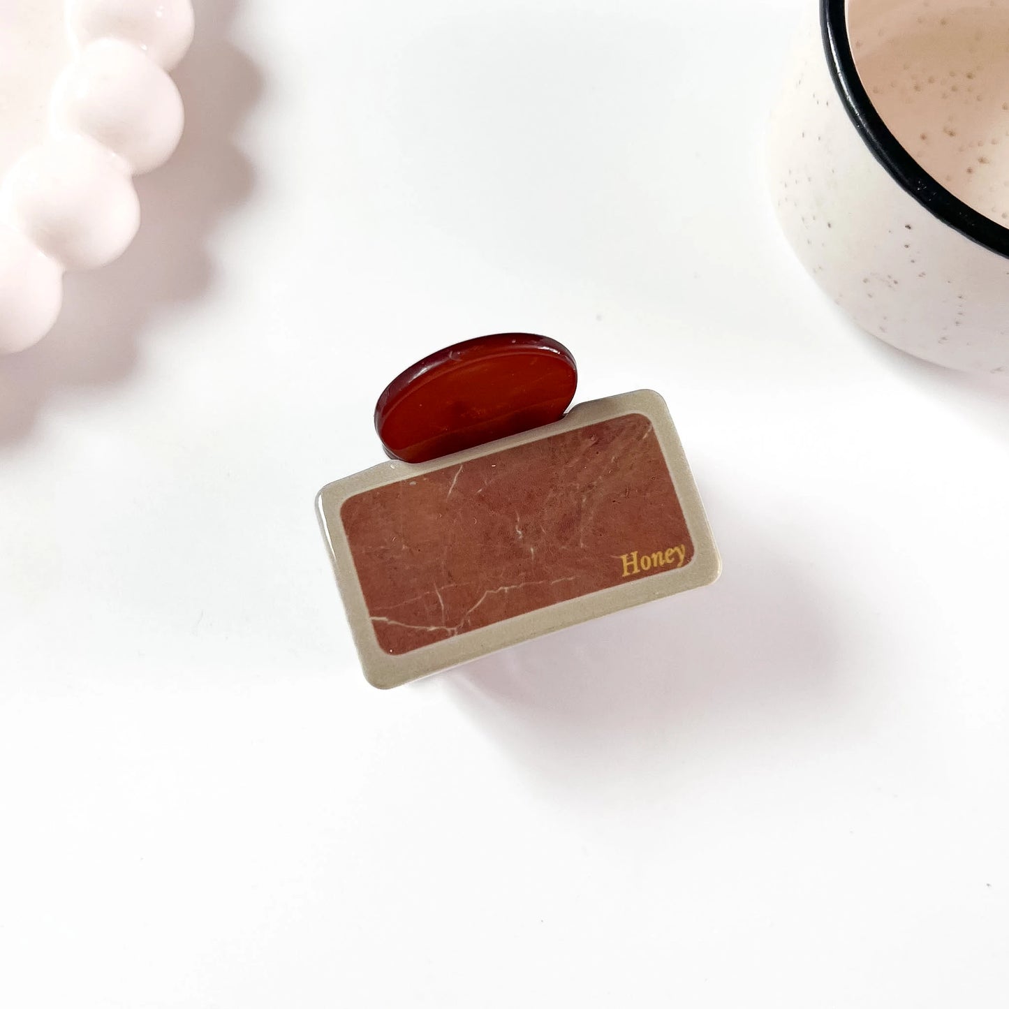 Marble tile claw clip rust terracotta with brown marble print