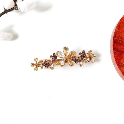Champagne gold crystal flower hair barrette with rhinestone butterflies, a fancy side hair clip with stones