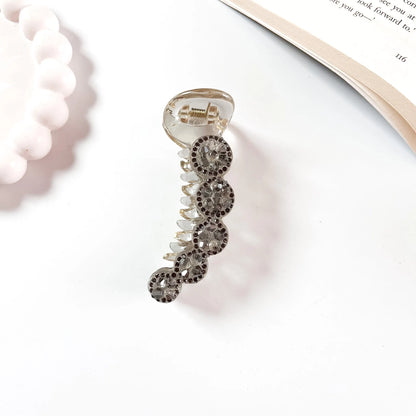 Medallion crystal banana clip smoke grey rhinestone clutcher