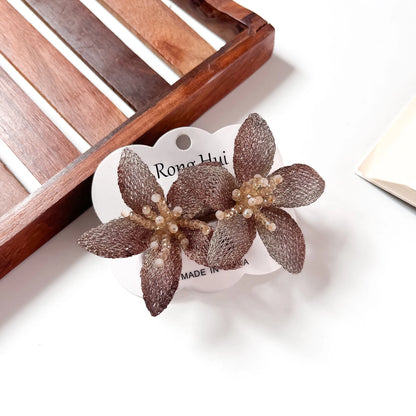 Bronze mesh lily flower clip duo for women