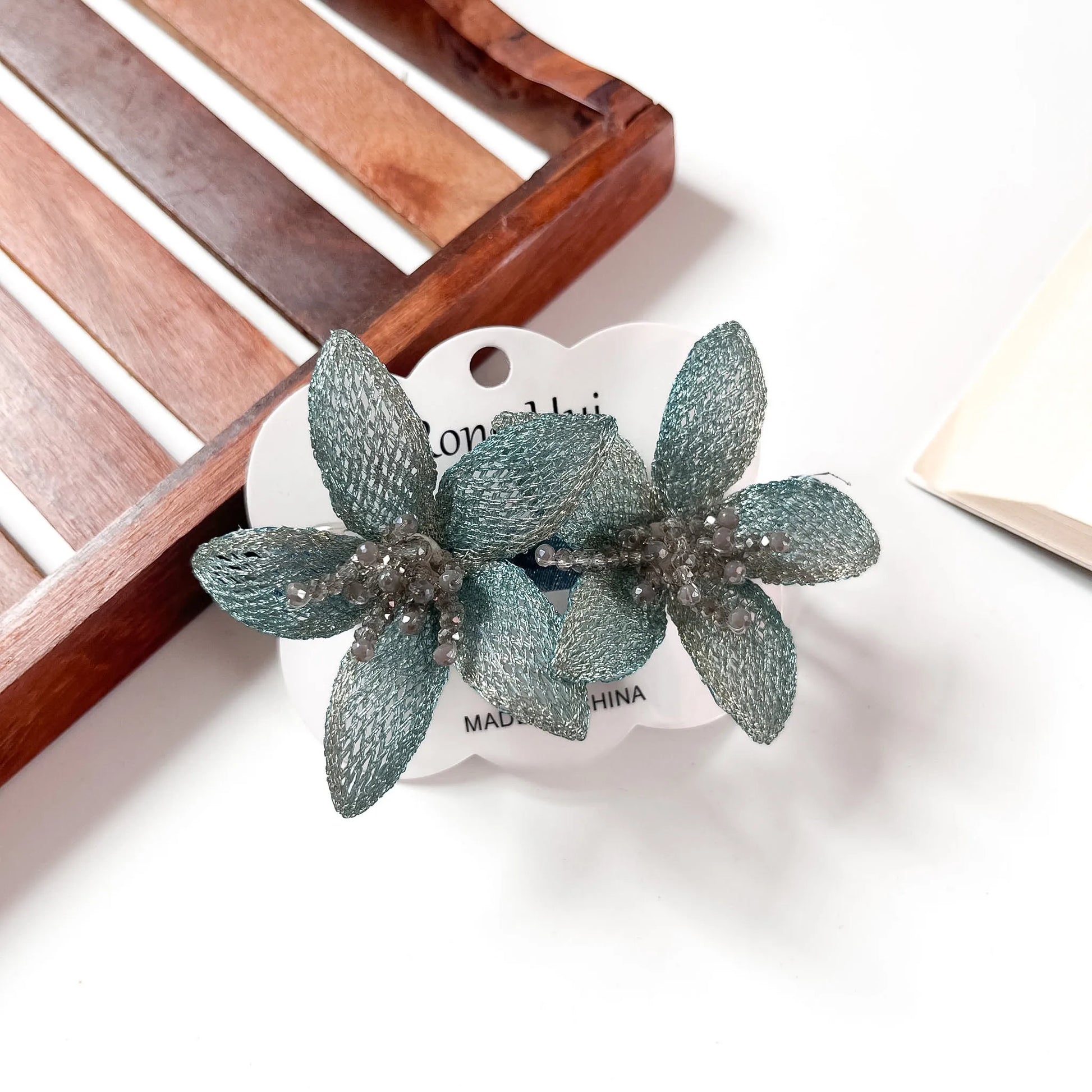 Sage mesh lily flower clip duo for women