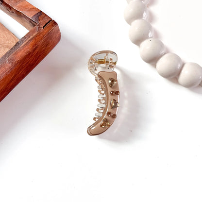 Taupe/brown minimal banana clip with faceted heart gem and scattered rhinestones, 5cm