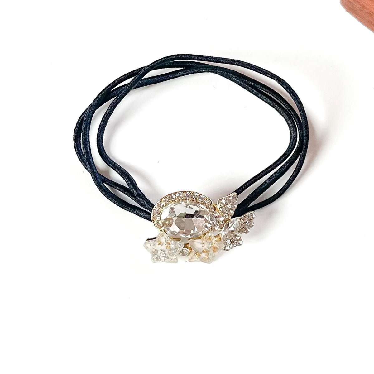 Moon white fancy hair elastic with clear oval crystal, crystal butterfly and white stars, jewelled hair tie