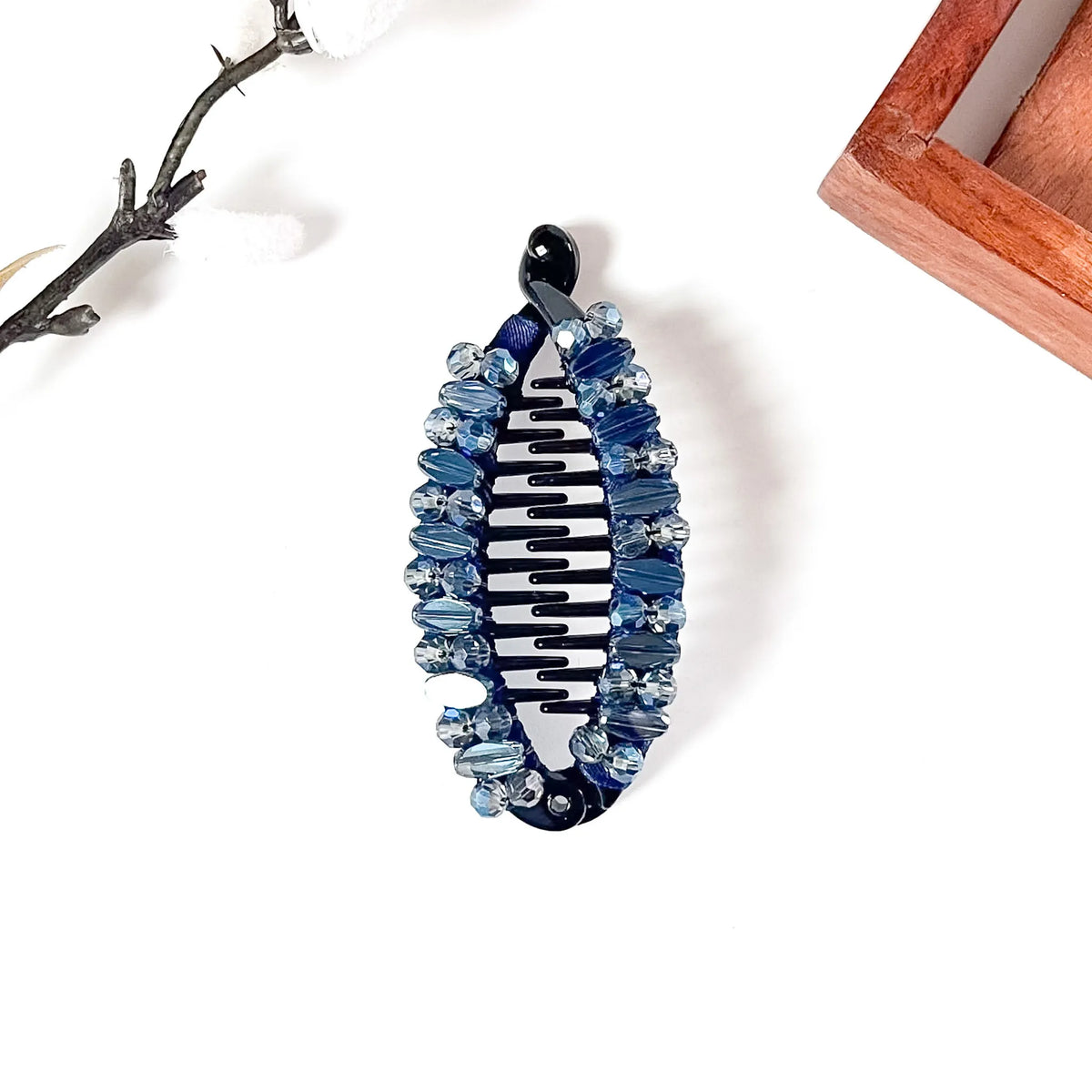 Navy blue crystal fish banana clip with interlocking comb teeth