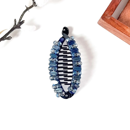 Navy blue crystal fish banana clip with interlocking comb teeth