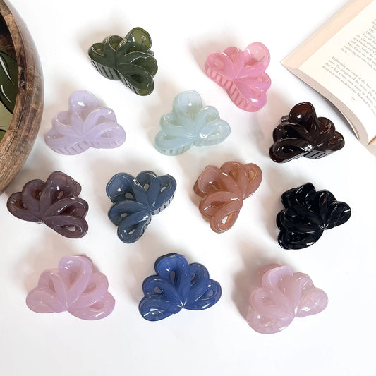 Ocean Loop medium claw clip in glossy blue with loop petal design, perfect for medium length hair styling and everyday wear