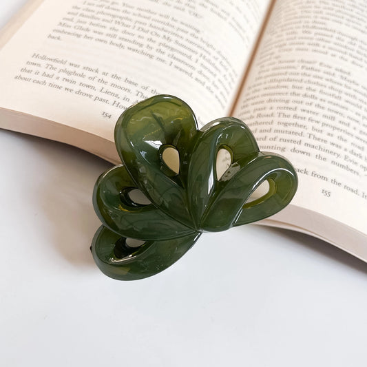 Olive green medium claw clip with glossy loop design, stylish hair claw for medium hair and casual everyday looks