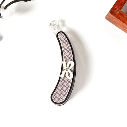 Black lock banana clip with brown plaid interior and beige flower accent, large 10cm size for all hair types