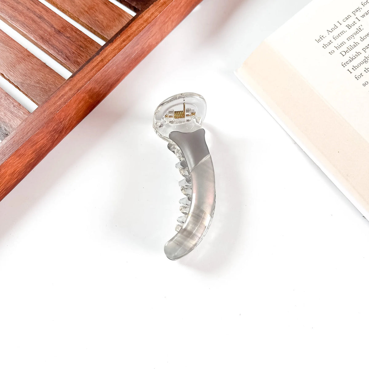 Grey banana clip hair clutcher transparent body
