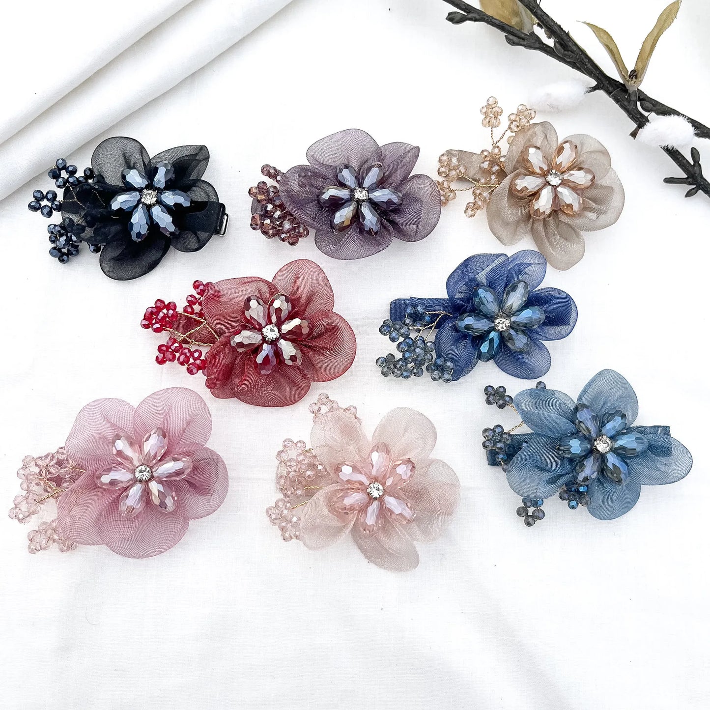 Color swatch: all 7 ornate bloom alligator clip shades displayed together