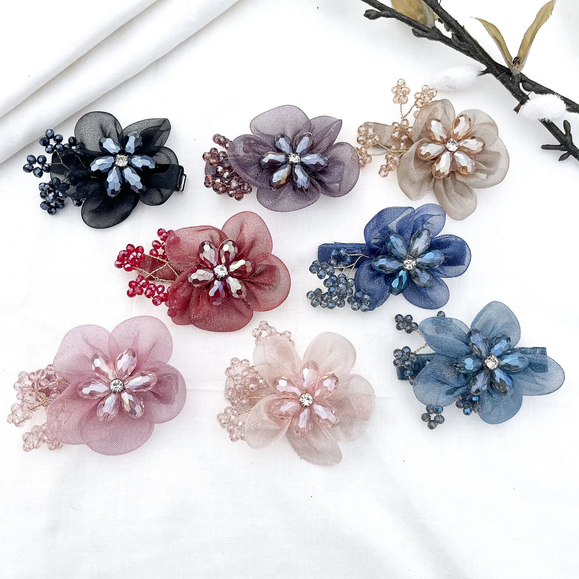 Color swatch: all 7 ornate bloom alligator clip shades displayed together