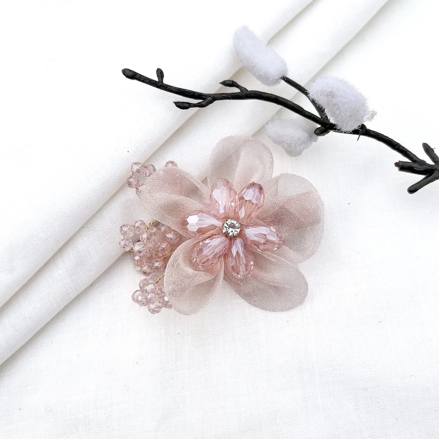 Cream ornate alligator clip with layered mesh petals, crystal flower and faceted details,