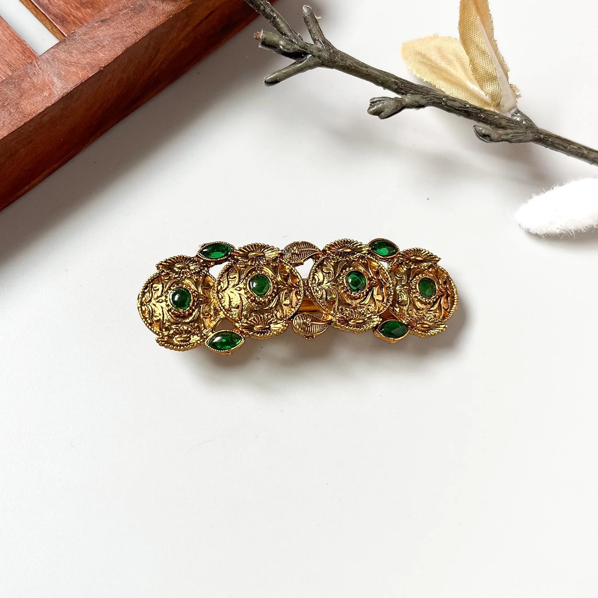 Antique gold medallion barrette with emerald green stones, filigree chain design, 5cm decorative clip