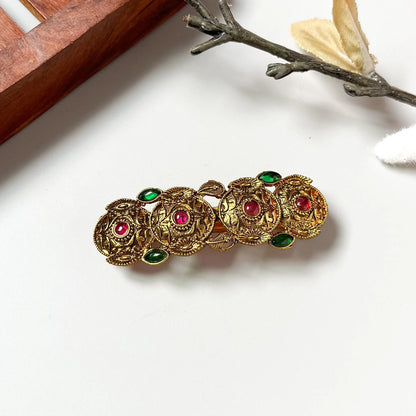 Vintage 5cm medallion cluster barrette with mixed emerald and ruby gemstones, ornate brass filigree