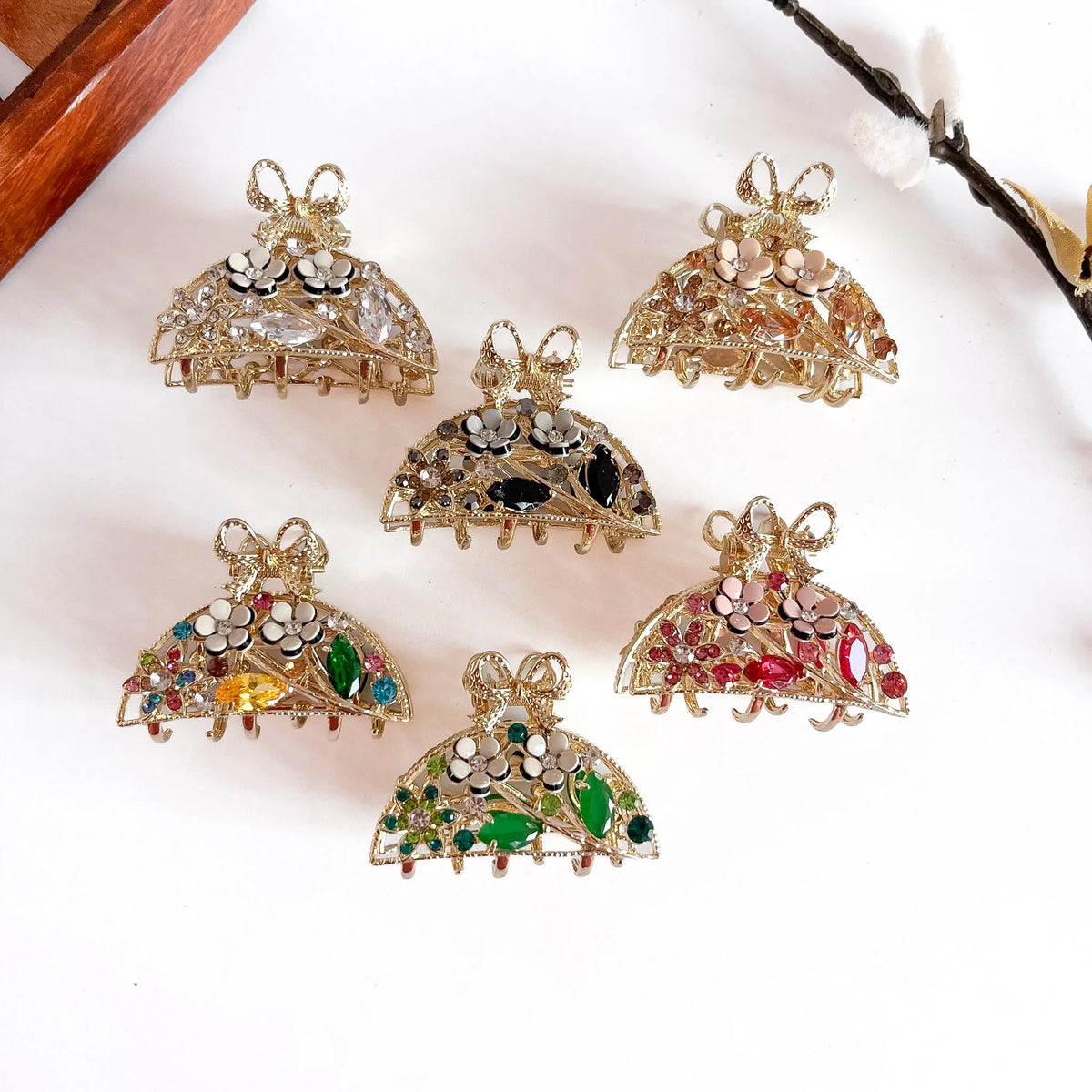 All 6 ornate pearl bow clips: ruby, sapphire, emerald, amber, crystal, rainbow with metal filigree