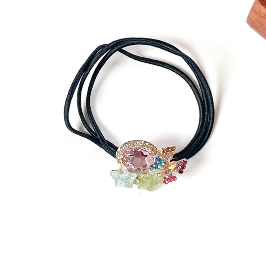 Pastel multicolour rhinestone hair tie with pink oval crystal, colourful butterfly and mint glitter stars