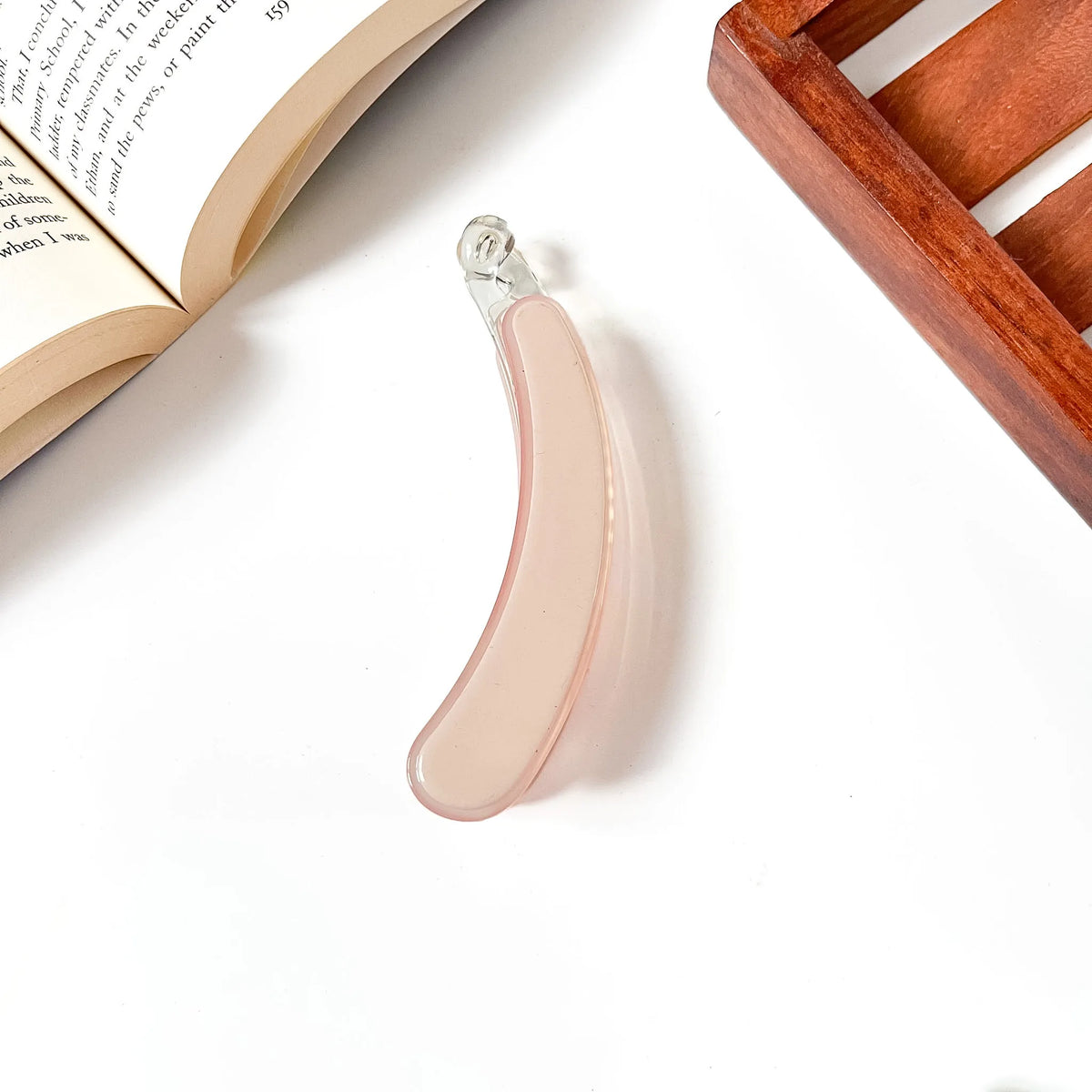 Blush pink smooth resin banana hair clip, minimalist design for medium hair