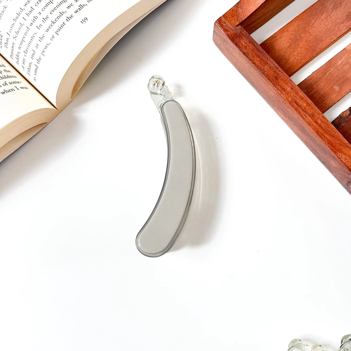 Grey slate banana clip with polished resin finish, lightweight hair clutcher