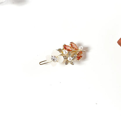 Peach orange stone hair clip with pearl flower for festive wear
