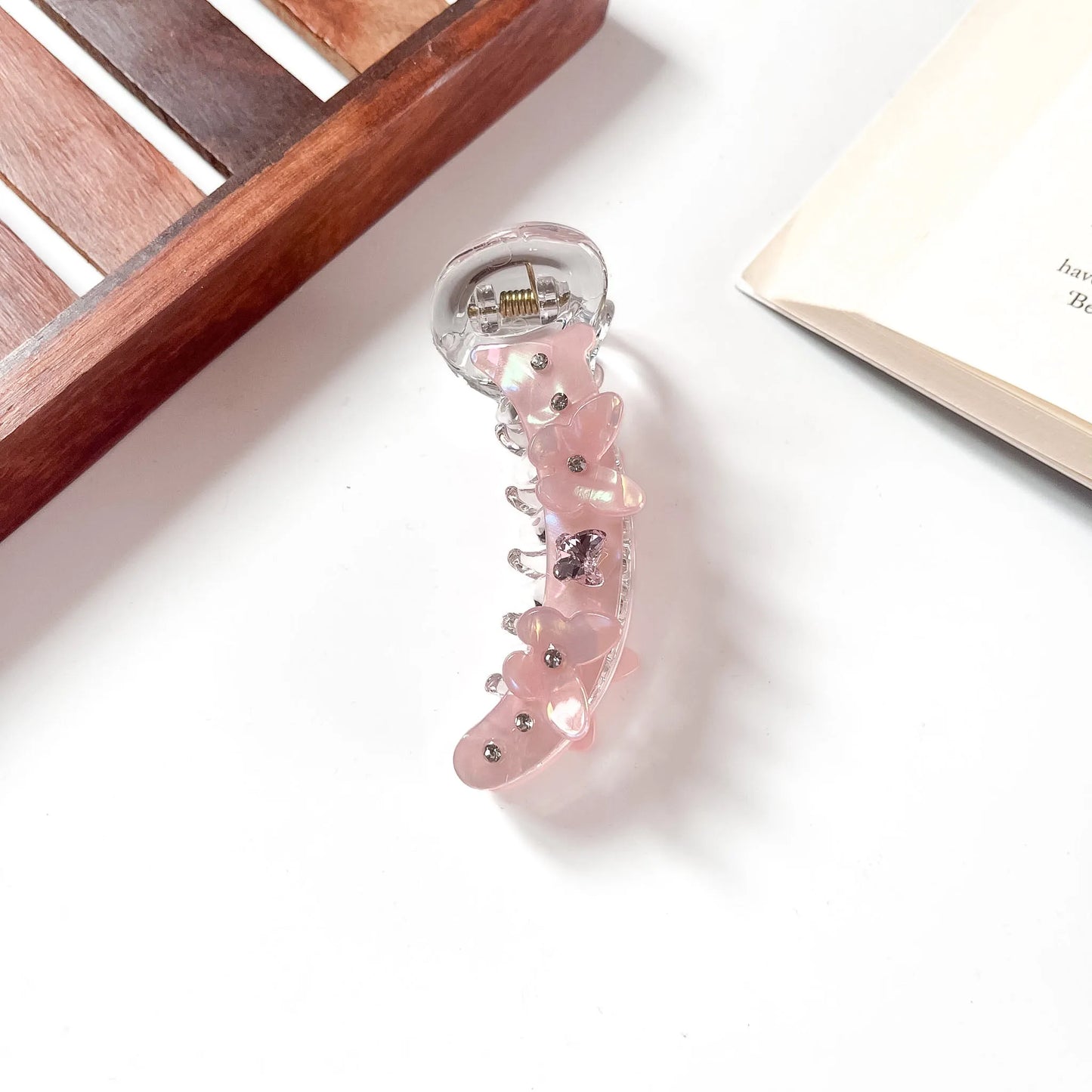 Blush pink iridescent banana clip with butterfly charms