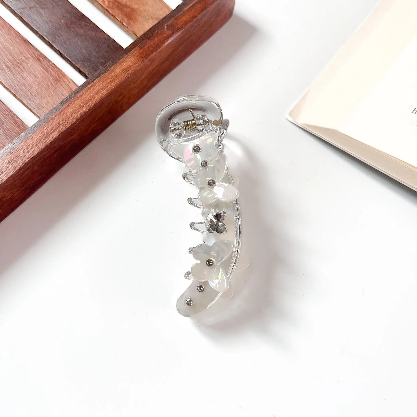 Pearl white iridescent banana clip with crystal accent