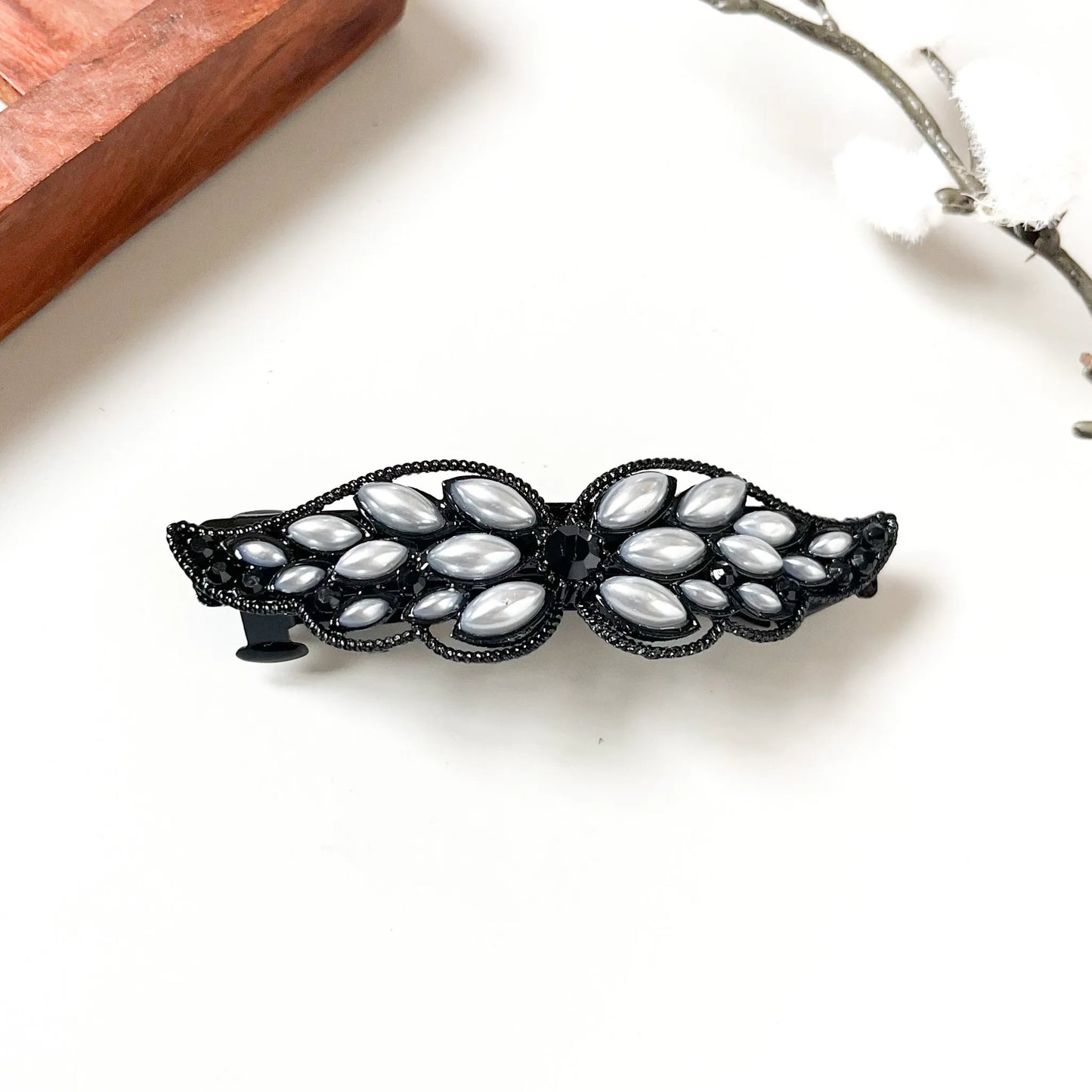 Black pearl cabochon wing barrette with milky ovals and dark centre stone, modern hair accessory