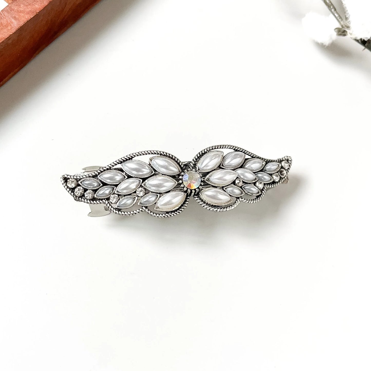 Silver pearl cabochon wing barrette with milky ovals and iridescent centre stone, medium hair clip