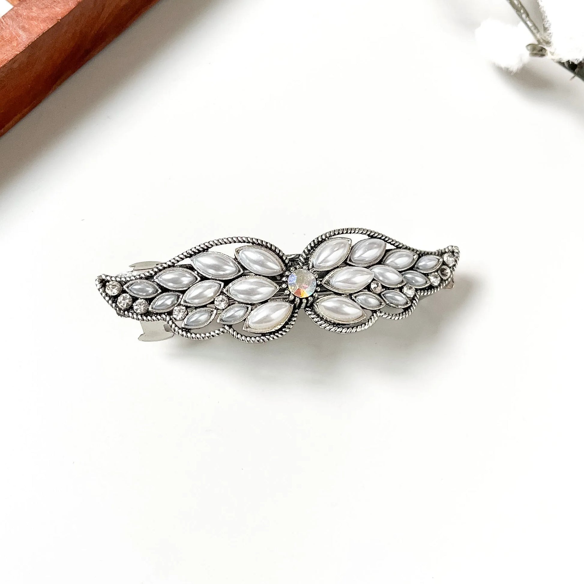 Silver pearl cabochon wing barrette with milky ovals and iridescent centre stone, medium hair clip