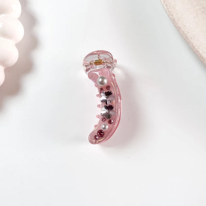 Pearl crystal banana clip pink with rhinestone flower embellishment