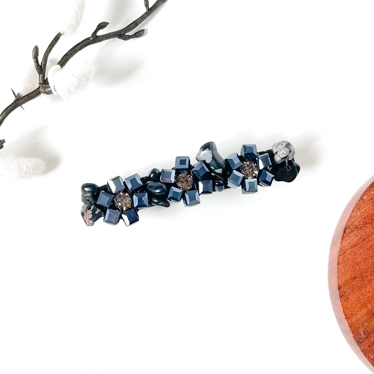 Noir black cube crystal flower hair clip with polished stone chips, an elegant black barrette
