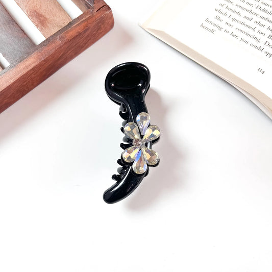 Black petal bloom banana clip with crystal flower