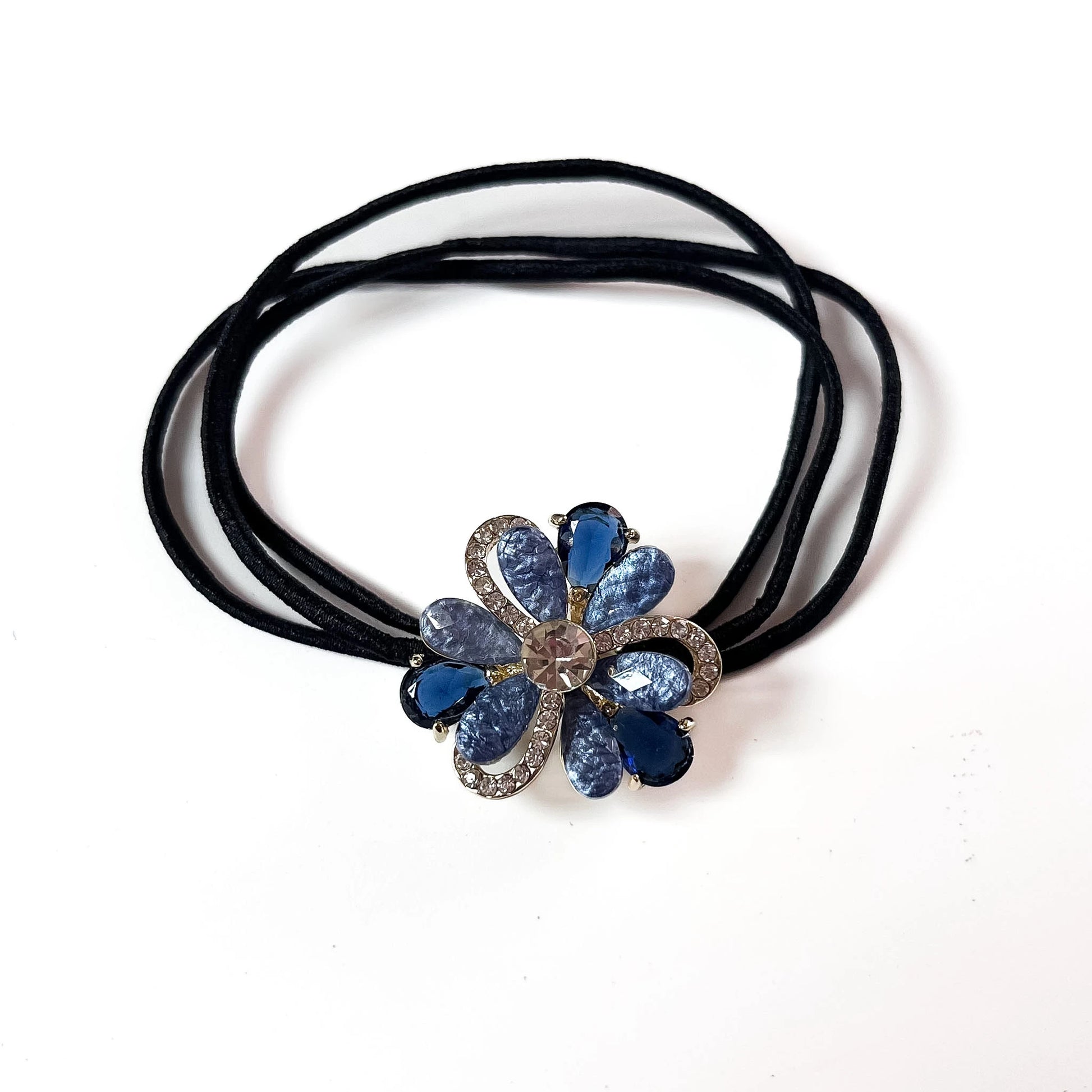 Navy Blue petal bloom flower crystal hair tie with rhinestone frame on black elastic band