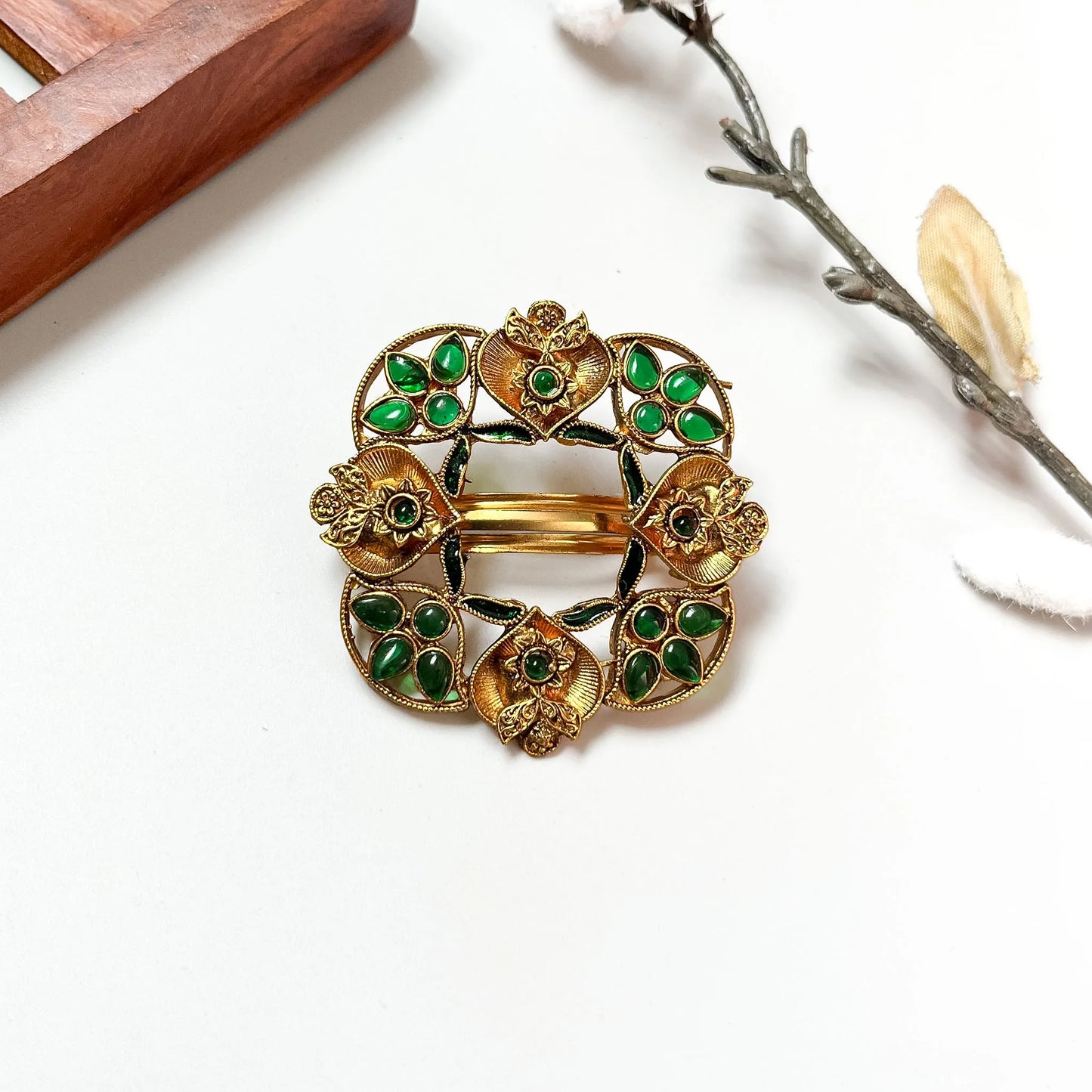 Emerald gemstone petalled shield barrette with four jewel sections and central flower, antique gold 4cm